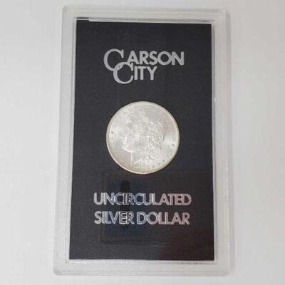 #1205 â€¢ 1885 Morgan Silver Dollar. New Orleans Mint Uncirculated Morgan Silver Dollar.