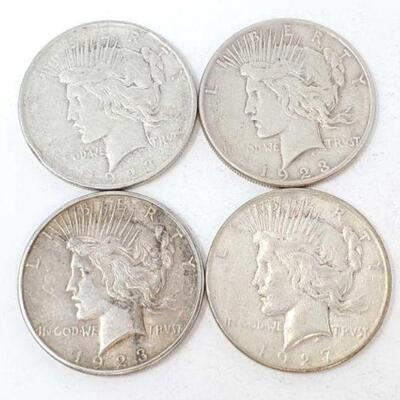 #1513 â€¢ (4) 1923-1927 Silver Peace Dollars, 106.8g. Weighs Approx: 106.8g (2) 1923 San Francisco Mints, (1) 1923 Denver Mint, (1) 1927...
