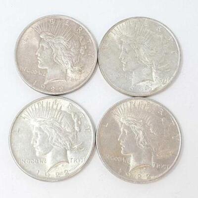 #1528 â€¢ (4) 1922 Silver Peace Dollars,107.1g. 
