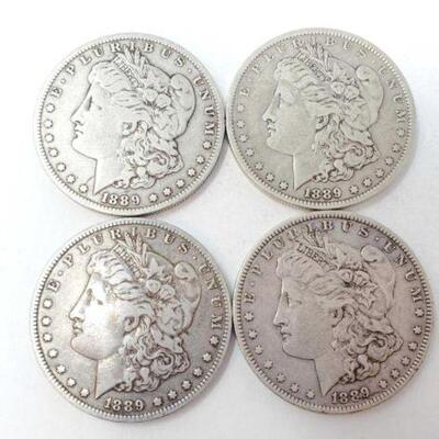 #1269 â€¢ (4) 1889 Morgan Silver Dollars, 106g. Weighs Approx: 106g New Orleans Mints.