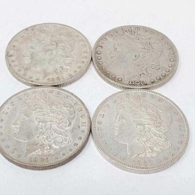#1335 â€¢ (4) 1881 Morgan Silver Dollars, 107g. Weighs Approx: 107g New Orleans Mints. Weighs Approx: 107g New Orleans Mints. 