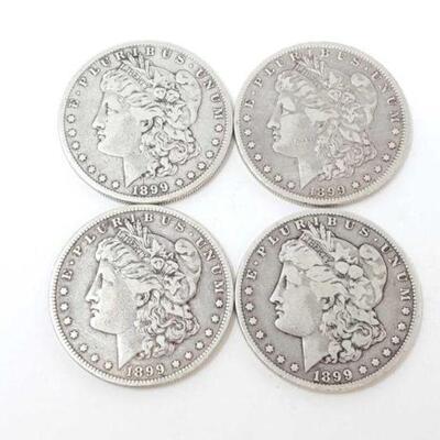 #1298 â€¢ (4) 1899 Morgan Silver Dollars, 105.5g. Weighs Approx: 105.5g New Orleans Mints.