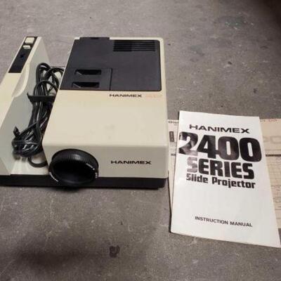 2054 â€¢ Hanimex 2400 Series Slide.Projector in Original Box. Includes Manual. 
