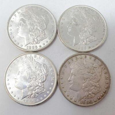 #1267 â€¢ (4) 1886 Morgan Silver Dollars, 107g. Weighs Approx: 107g Philadelphia Mints.
