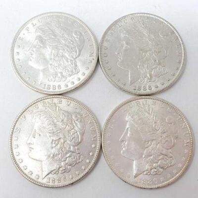 #1259 â€¢ (4) 1886 Morgan Silver Dollars, 107g. Weighs Approx: 107g Philadelphia Mints. 