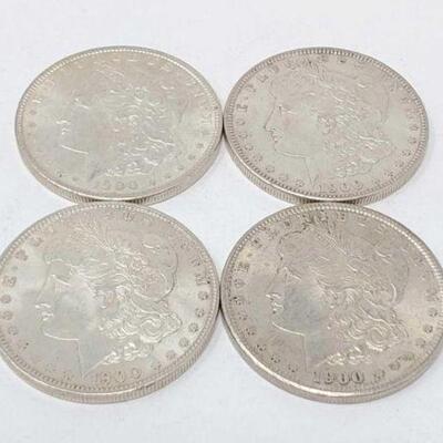 #1329 â€¢ (4) 1900 Morgan Silver Dollars, 106.9g.  Weighs Approx: 106.9g Philadelphia Mints. 