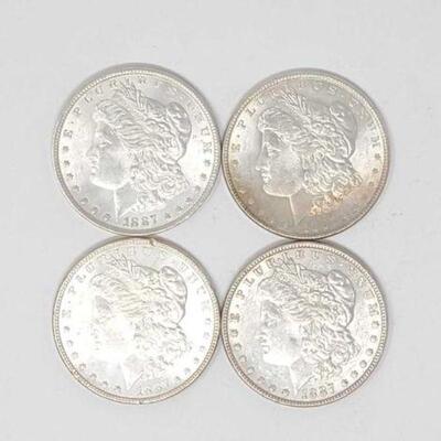 #1318 â€¢ (4) 1887 Morgan Silver Dollars, 107.2g. Weighs Approx: 107.2g Philadelphia Mints. 