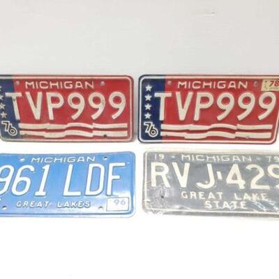#2156 â€¢ 4 Vintage Michigain License Plates. 