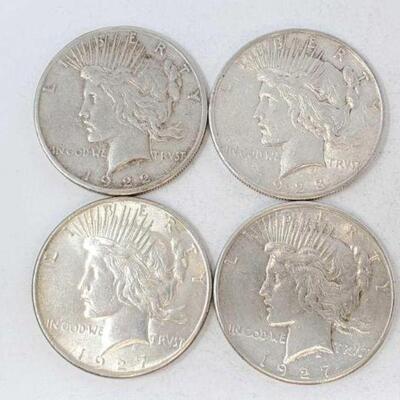 #1511 â€¢ (4) 1922-1927 Silver Peace Dollars, 106.8g. #1511 â€¢ (4) 1922-1927 Silver Peace Dollars, 106.8g. 