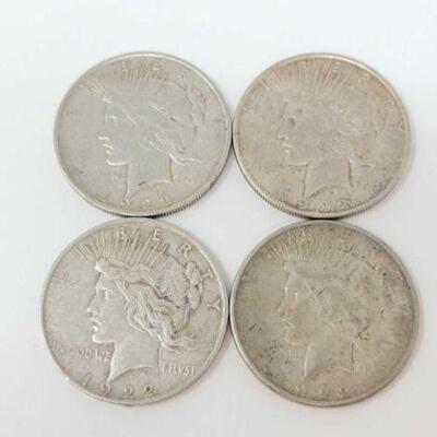 #1523 â€¢ (4) 1922 Silver Peace Dollars, 106.7g. Weighs Approx: 106.7g (3) Denver Mints and (1) San Francisco Mint