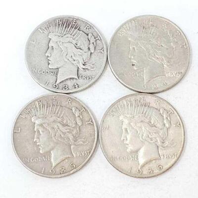 #1517 â€¢ (4) 1934-1935 Silver Peace Dollars, 106.6g. Weighs Approx: 106.6g San Francisco Mints. 