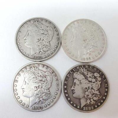 #1240 â€¢ (4) 1882 Morgan Silver Dollars, 105.4g. Weighs Approx: 105.4g Philadelphia Mints.Weighs Approx: 105.4g Philadelphia Mints