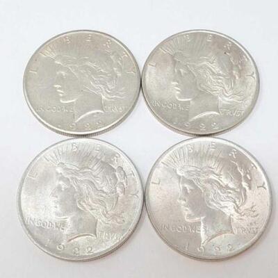 #1548 â€¢ (4) 1922 Silver Peace Dollars, 107.2g. Weighs Approx: 107.2g (3) Philadelphia Mints and (1) San Francisco Mint.