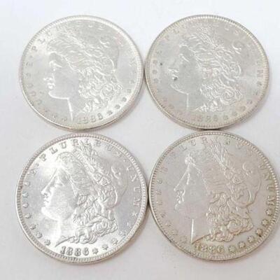 #1253 â€¢ (4) 1886 Morgan Silver Dollars, 107.1g. Weighs Approx: 107.1g Philadelphia Mints