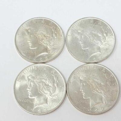 #1527 â€¢ (4) 1923 Silver Peace Dollars, 107g. Weighs Approx: 107g Philadelphia Mints