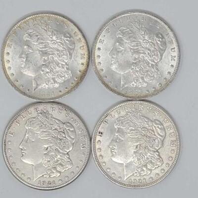 #1350 â€¢ (4) 1884-1921 Morgan Silver Dollars..(2) 1884 & 1885 New Orleans, (1) 1921 San Francisco and (1) 1921 Philadelphia Mints. 