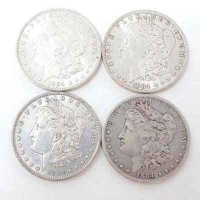 #1293 â€¢ (4) 1884 Morgan Silver Dollars, 106.8g. Weighs Approx: 106.8g New Orleans Mints. 