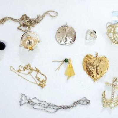 1307	LOT OF LADIES CHAINS AND PENDANT INCLUDING SCRIMSHAW BASKET
