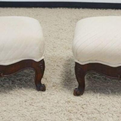 1209	PAIR OF EMPIRE UPHOLSTERED FOOT STOOLS, SOME STAINING ON UPHOLSTERY, APPROXIMATELY 21 IN X 16 IN X 14 IN HIGH
