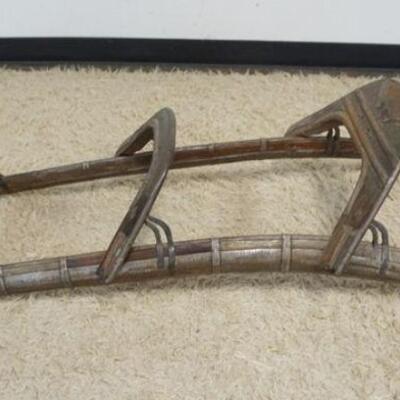 1219	WOOD & METAL CAMEL SEAT SADDLE, APPROXIMATELY 19 IN X 53 IN X 13 1/2 IN HIGH
