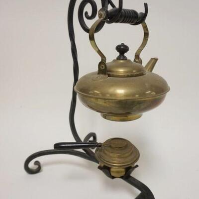 1023	BRASS TEAPOT ON FANCY WROUGHT IRON STAND W/WARMER, APPROXIMATELY 14 1/2 IN HIGH
