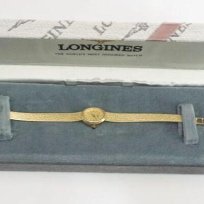1295	LONGINES 14K LADIES WATCH AND BAND IN ORIGINAL BOX, ANNIVERSARY GIFT FROM JOHNSON AND JOHNSON, LENGTH APPROXIMATELY 6 IN, 10.71 DWT...