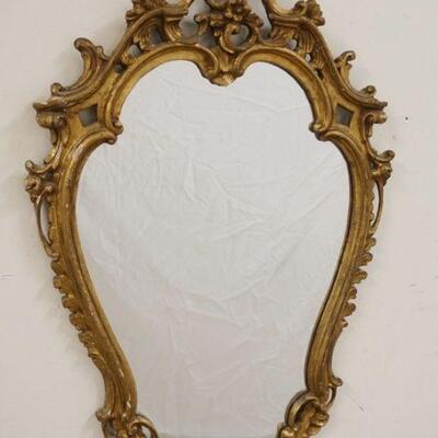 1147	MIRROR IN ANTIQUE PIERCED GILTWOOD FRAME, APPROXIMATLEY 36 IN X 22 IN
