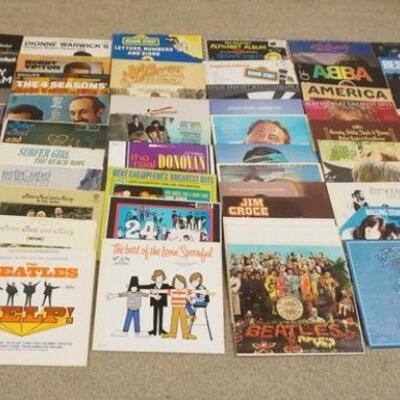1317	LOT OF CLASSIC & CONTEMPORARY ROCK ALBUMS & 45'S
