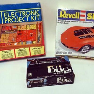 1285	VINTAGE TOY LOT; SCIENCE FAIR ORIGINAL PROJECT KIT, BLIP DIGITIAL GAME AND REVELL 1/16 CORVETTE CAR KIT SEAL IN BOX 1981
