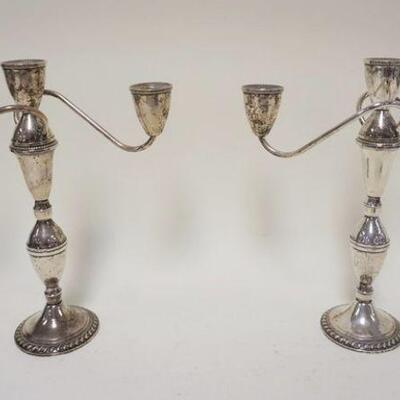 1201	PAIR OF STERLING WEIGHTED CANDLESTICKS, APPROXIMATELY 11 1/2 IN HIGH
