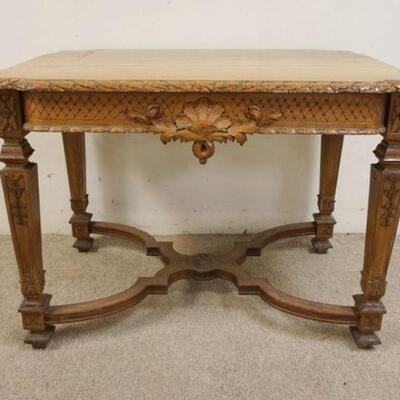 1124	MAHOGANY PARLOR TABLE W/CARVED SKIRT & TABLE EDGES, APPROXIMATELY 41 IN X 26 IN X 29 IN HIGH
