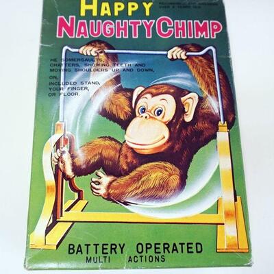 1271	VINTAGE BATTERY OPERATED TOY, HAPPY NAUGHTY CHIMP, JAPAN, APPROXIMATELY 7 IN HIGH
