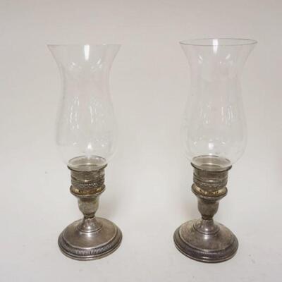 1202	PAIR OF STERLING WEIGHTED CANDLESTICKS W/WHEEL CUT HURRICANE SHADES, 10 1/4 IN HIGH
