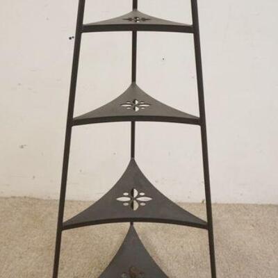 1141	METAL TRIANGULAR SHELF W/TAPERED TOP, EACH SHELF HAS CUT OUT DESIGN, APPROXIMATELY 40 3/4 IN HIGH

