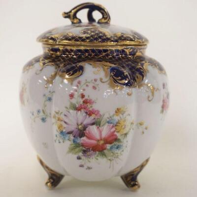 1054	CHINA FOOTED & RIBBED BISQUIT JAR W/HAND PAINTED FLOWERS, APPROXIMATELY 8 IN HIGH
