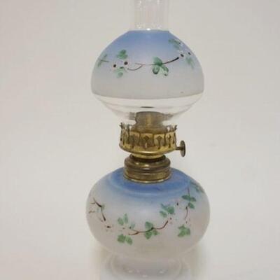 1077	MINIATURE KEROSENE LAMP W/MILK GLASS FONT & HAND PAINTED FLOWERS, APPROXIMATELY 9 3/4 IN HIGH
