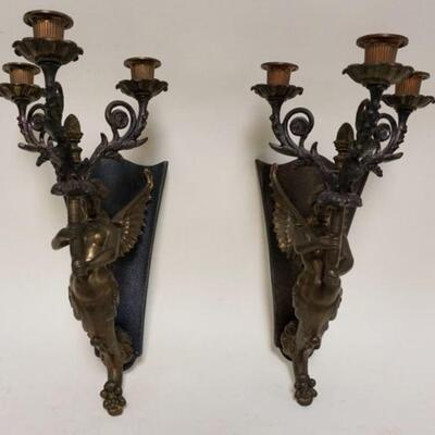 1195	PAIR OF CAST METAL FIGURAL WALL CANDLE SCONCES, WINGED, APPROXIMATELY 17 IN HIGH
