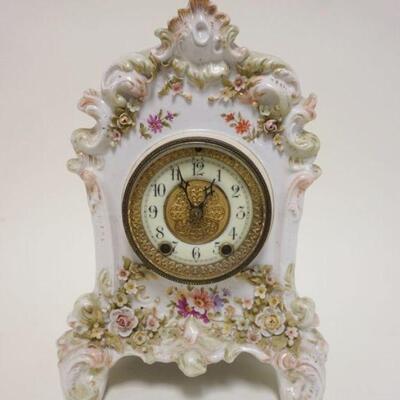 1050	WATERBURY ROYAL BONN CHINA CLOCK W/APPLIED FLOWER DECORATION, APPROXIMATELY 8 IN X 5 1/4 IN X 11 IN HIGH
