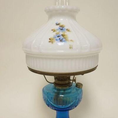 1058	ALADDIN KEROSENE LAMP, BLUE LINCOLN DRAPE PATTERN W/HAND PAINTED & SIGNED MILK GLASS SHADE, APPROXIMATELY 21 1/2 IN, DATED 1889
