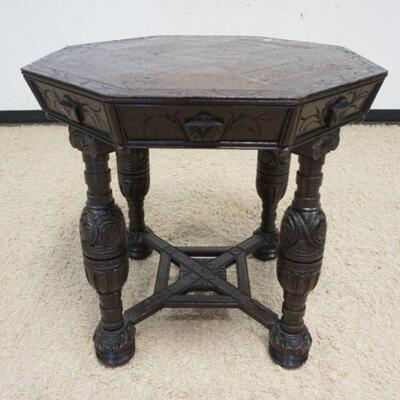 1216	ANTIQUE CARVED ENGLISH OAK OCTAGONAL TABLE W/INLAY ON TOP, LOSSES TO TOP EDGE, APPROXIMATELY 29 1/2 IN X 29 1/4 IN HIGH
