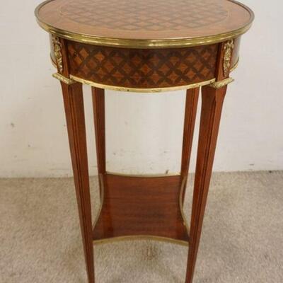 1151	ROUND MAHOGANY ONE DRAWER STAND W/DIAMOND QUILTED INLAID TOP & SIDES BRONZE TRIM & MOUNTS, APPROXIMATELY 16 1/4 IN X 28 1/2 ROUND
