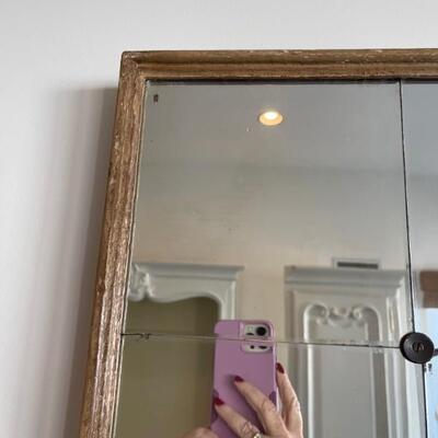Antique mirror with button