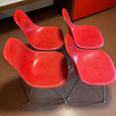 4 Herman Miller molded plastic chairs 
$900