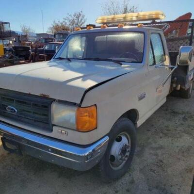 #1800 â€¢ 1988 Ford F-350: Features and Notes: Flat Bed And Morgan Crane. Contents In Bed Not Included