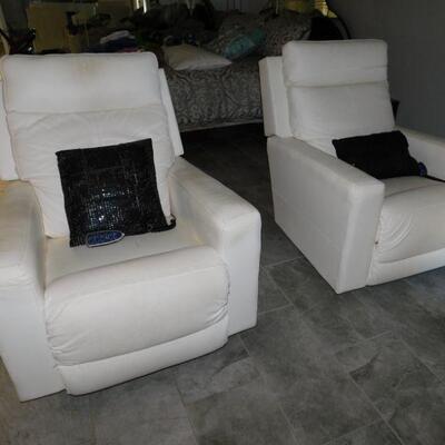 White reclining leather chairs