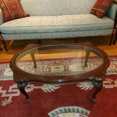 QueenAnne glass top oval coffee table 