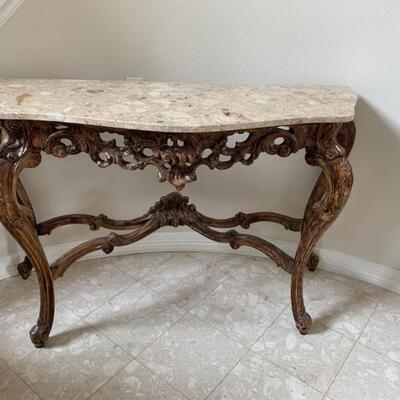 Carved French Design Console Table with Marble Top.                                                       34.75â€ H  57.5â€ W.  19.75â€D