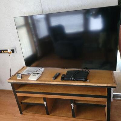 tv console and a flat screen tv