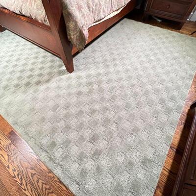 GREEN PATTERN AREA RUG | Textured patterned area carpet, appearing in overall good condition; 11 ft 6 in x 8 ft