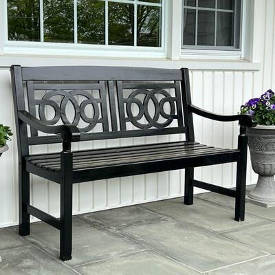 BLACK PAINTED BENCH | Outdoor bench, wood with black paint, patterned openwork back rest with slatted seat and scrolled arms; h. 36 x 48...